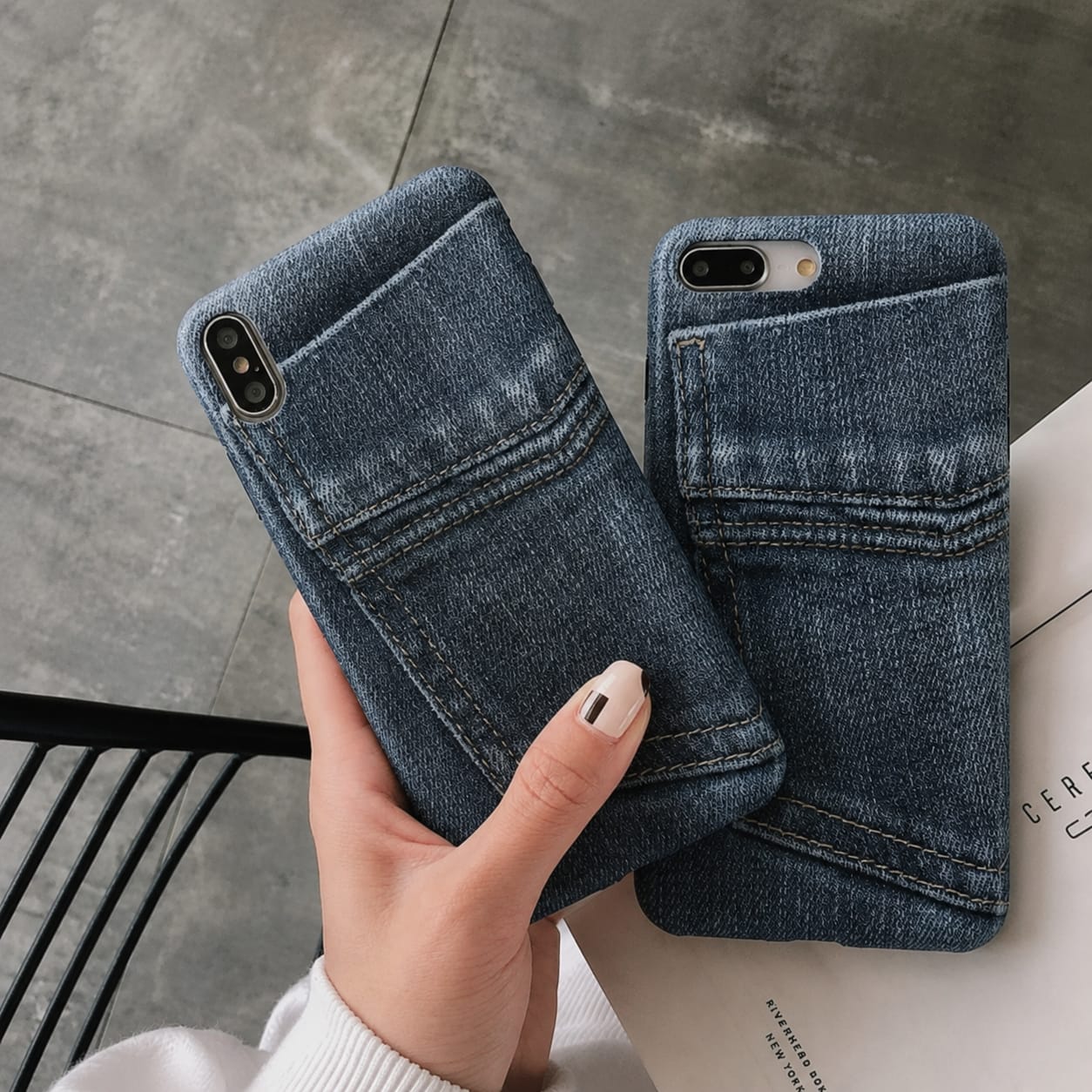 Two denim phone cases with pocket detail